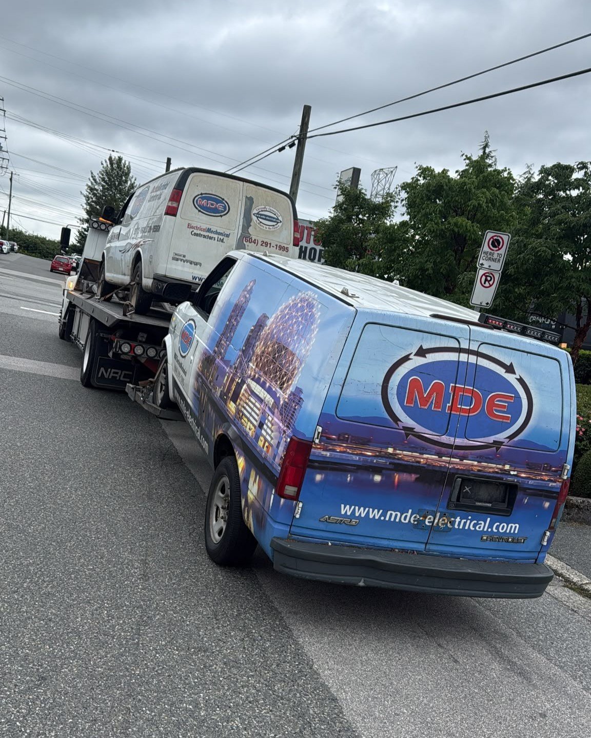 Tow truck loading a scrap car for Chilliwack Scrap Vehicle Removal