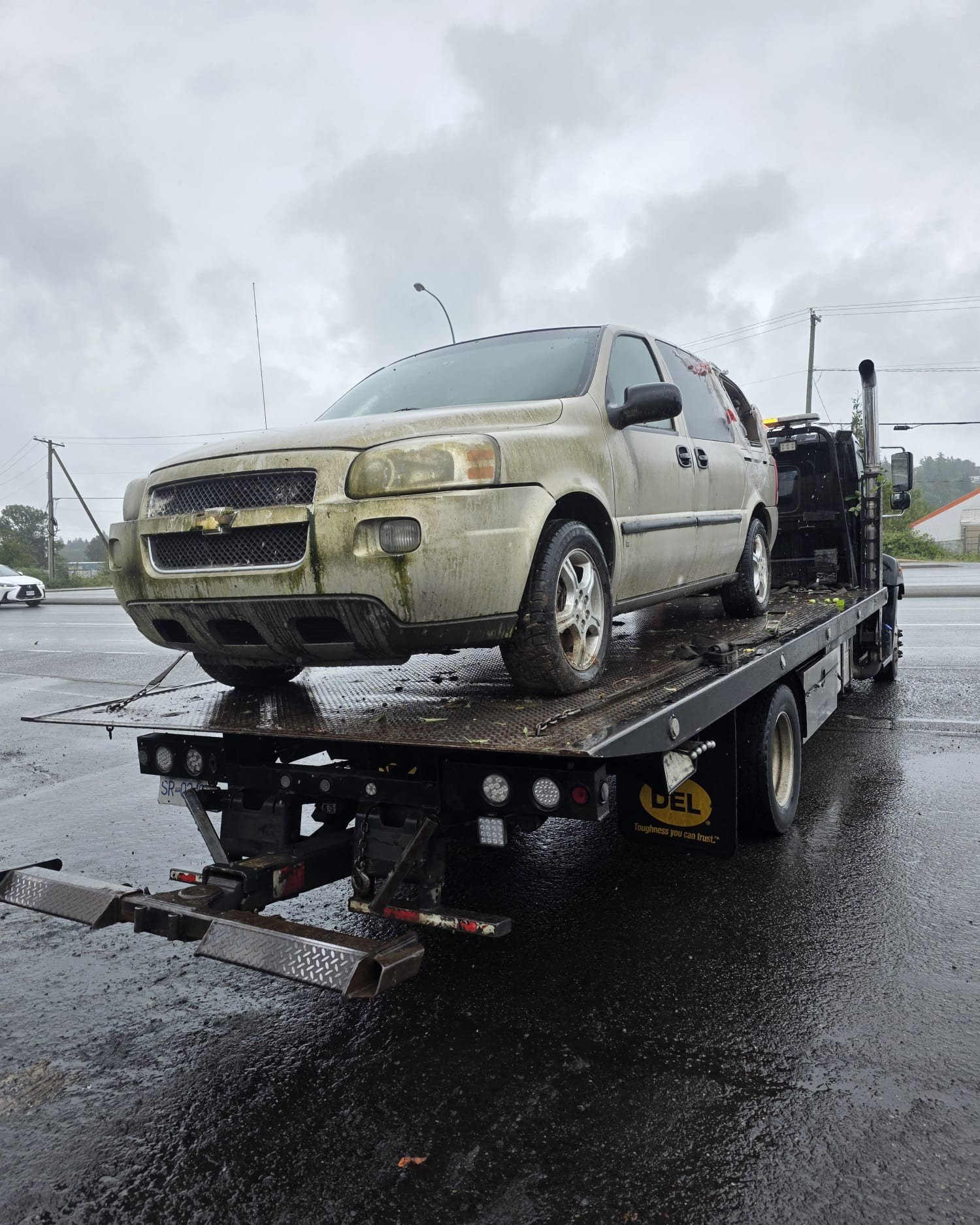 Free scrap car towing on a flatbed truck in Chilliwack